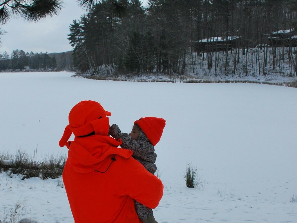 Hunter with infant