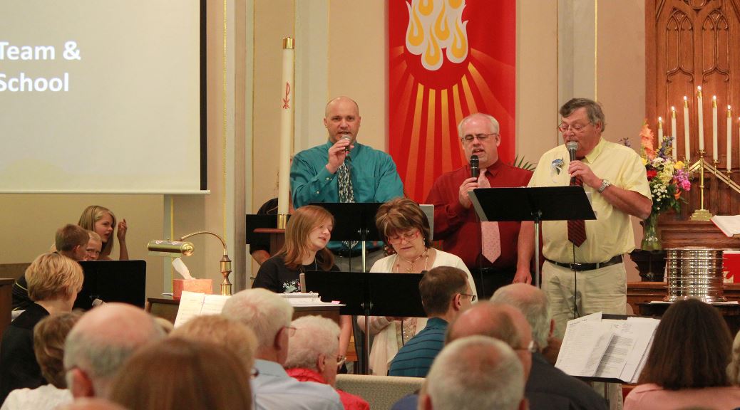 Three Men Singing in Worship