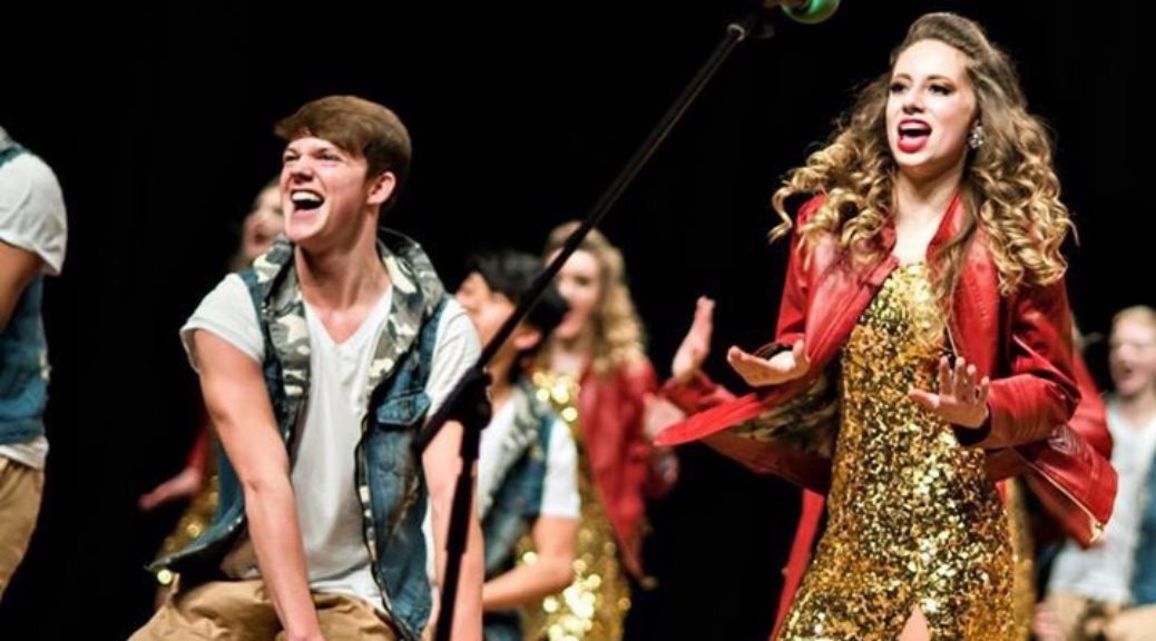 Two Show Choir Members Performing